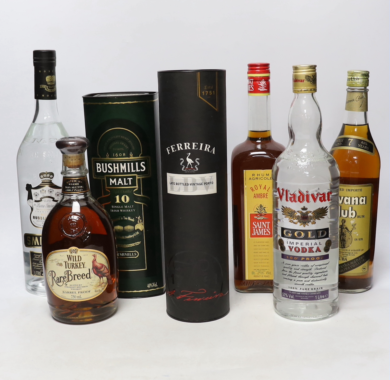 Ten bottles of assorted spirits including vodka and Rum